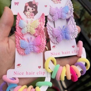 اربطة شعر ملونه مع كلبسه فراشه